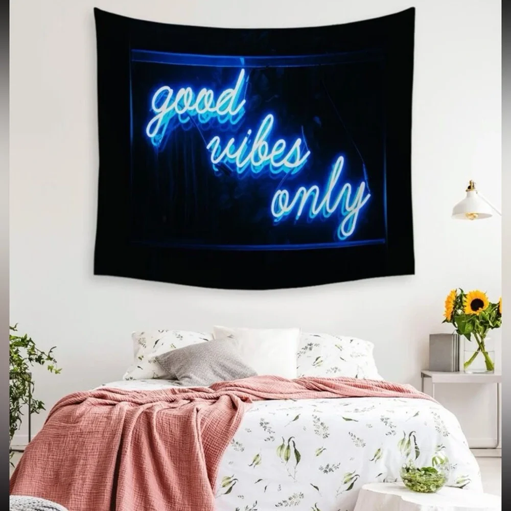 Black Tapestry with Blue Letters Graphic.